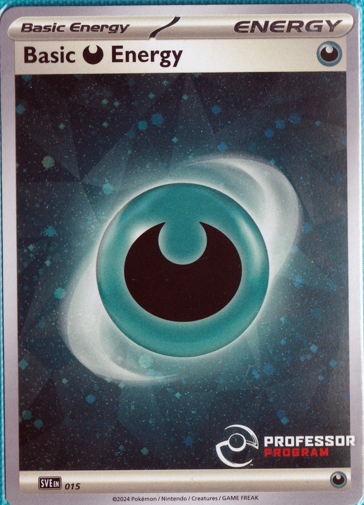Basic Darkness Energy SVE 015/142 Stellar Crown (Professor Program Stamp)